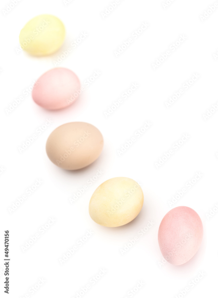 Semicircle of multicolored hen's eggs, isolated on white Semicircle of multicolored hen's eggs, isolated on white