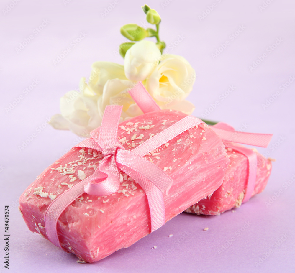 Natural handmade soap, on purple background Natural handmade soap, on purple background