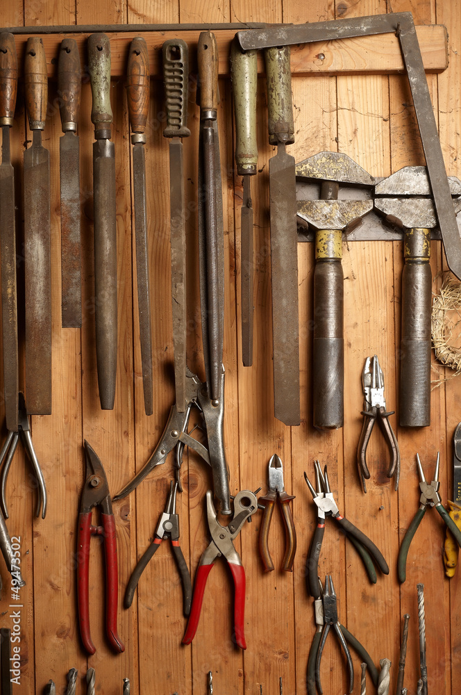 Set of different tools on wooden background Set of different tools on wooden background
