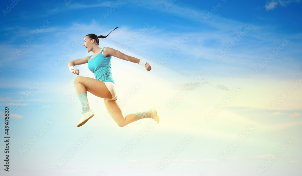 Image of sport woman jumping