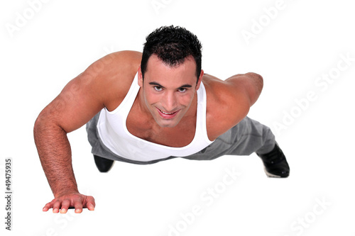 Young man doing push-ups