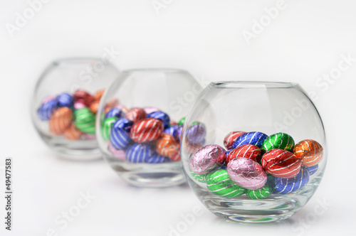 Glass spheres with chocolate easter-eggs