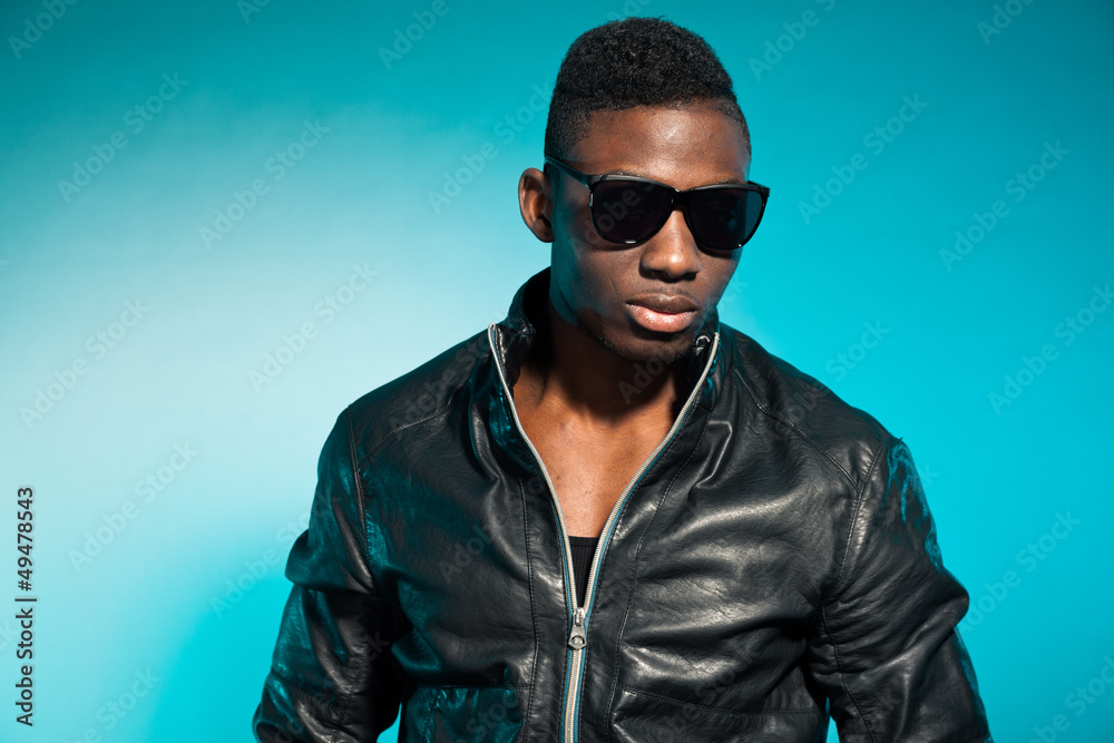 Obraz premium Cool urban stylish black american man. Fashion studio shot.