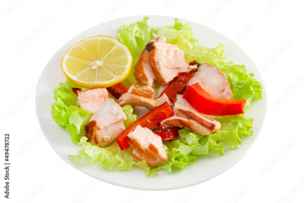 fish salad with lemon on the plate