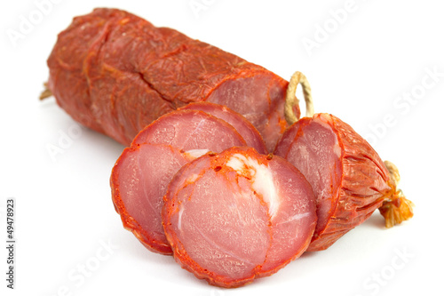 smoked sausage on white background photo