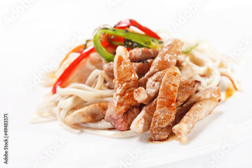 meat with noodles and vegetables