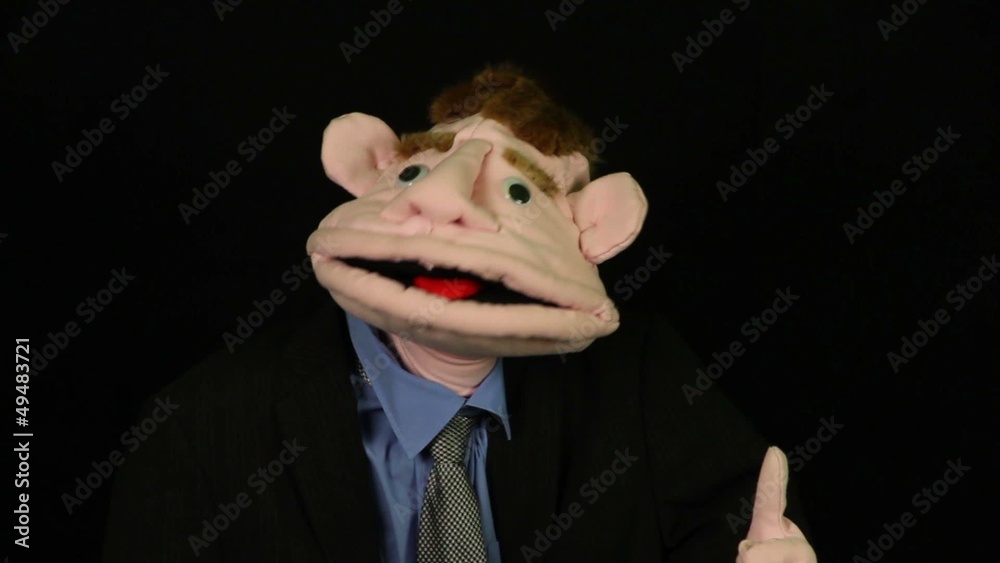 Puppet says on a black background Puppet says on a black background