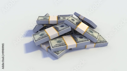 Camera turning around stack of Dollar bills.
