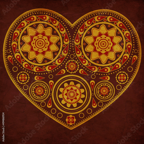 Grunge ornamental yellow heart © AnnaPa