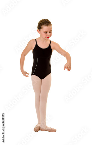 Young Ballet Dancer Practices Positions
