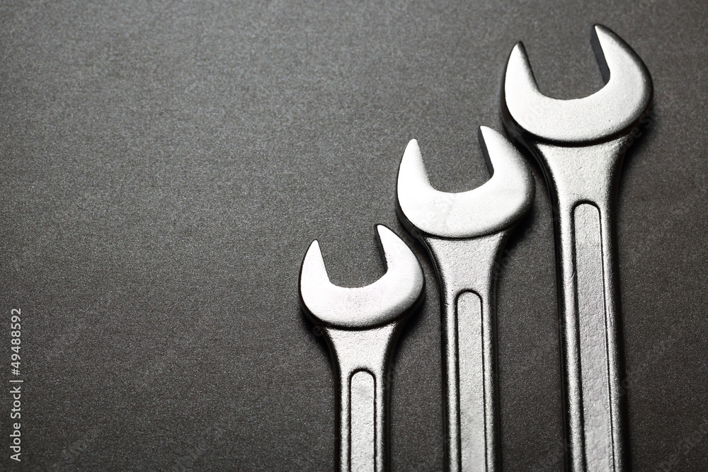 Screw keys on black background Screw keys on black background