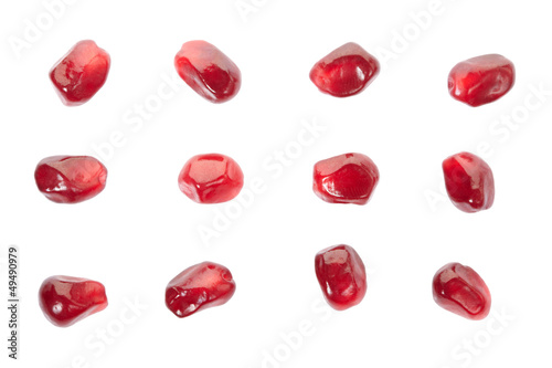 Pomegranate seed collection on white with clipping path
