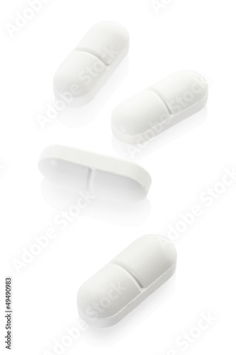 Medical pill tablets on white, clipping path included