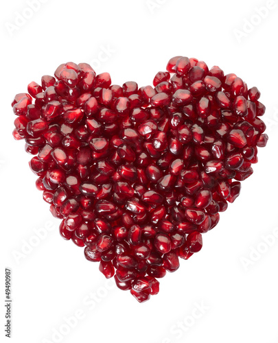 Pomegranate seed heart on white, clipping path included