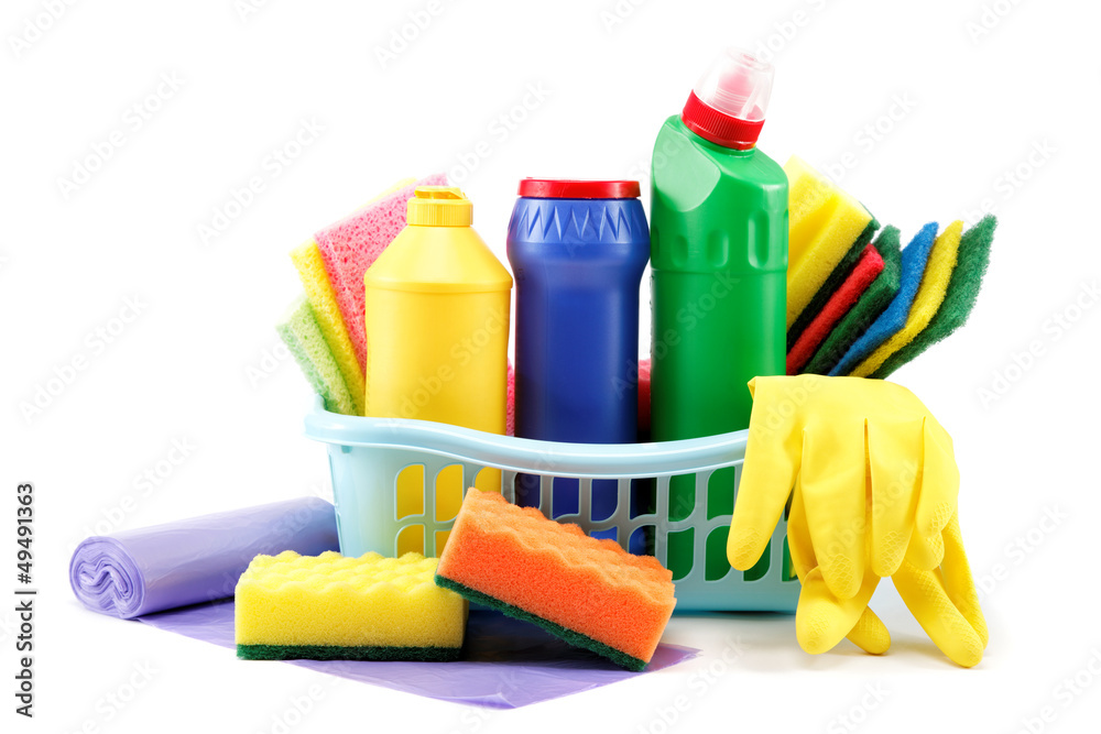 Detergent bottles, rubber gloves and cleaning sponge on a white Detergent bottles, rubber gloves and cleaning sponge on a white