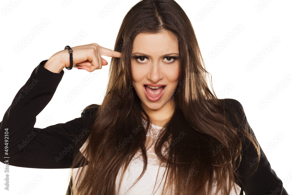 Beautiful Brunette Pointing With Finger On Her Head On White Beautiful Brunette Pointing With Finger On Her Head On White