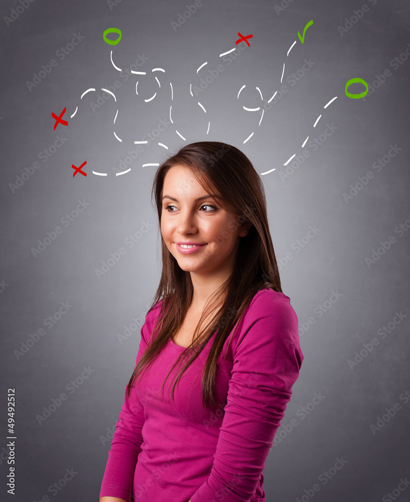Young woman thinking with abstract marks overhead Young woman thinking with abstract marks overhead