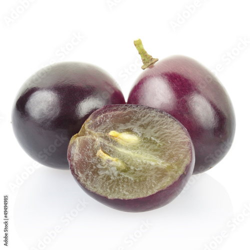 Red grape berries on white, clipping path included