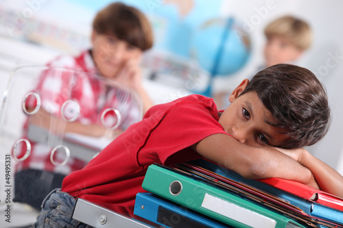 Child bored at school photo