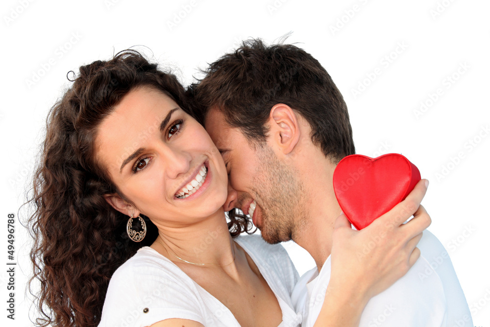 Couple with heart-shaped object