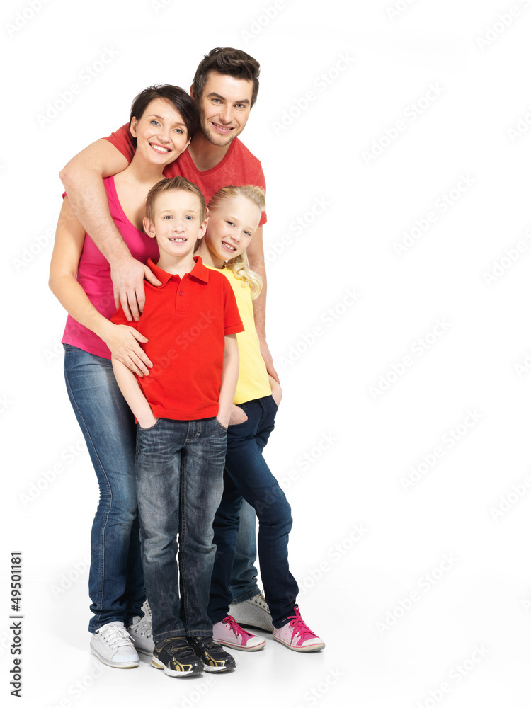 Full portrait of the happy young family with two children Full portrait of the happy young family with two children