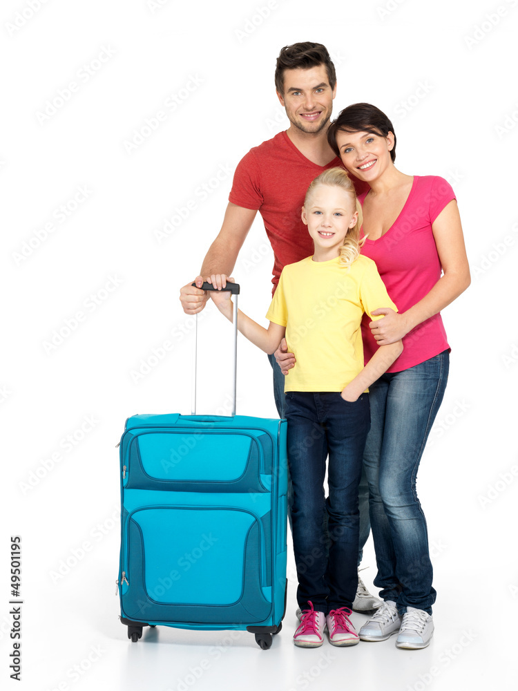Happy family with  suitcase  at studio