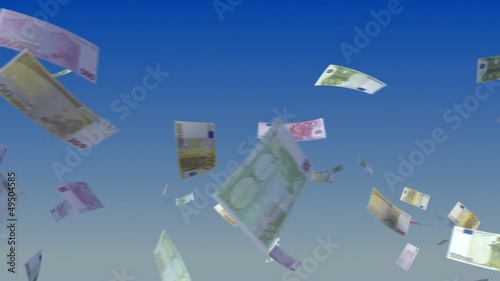 Flying Euro notes on sky background.