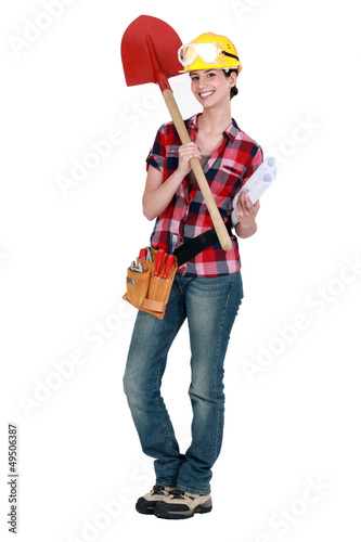 Female architect with shovel