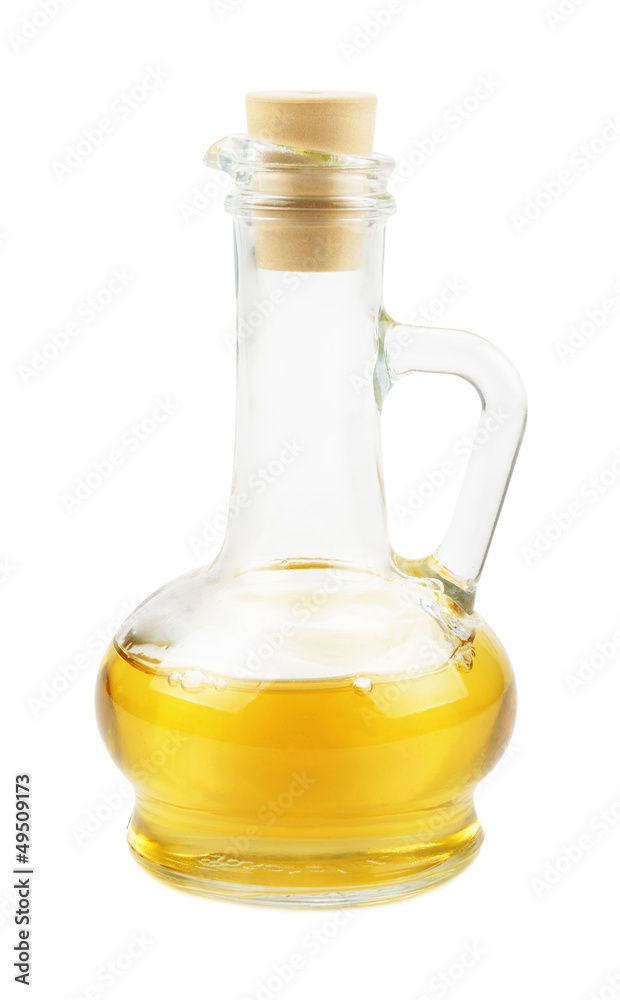 Glass carafe with vegetable oil isolated on white background Glass carafe with vegetable oil isolated on white background