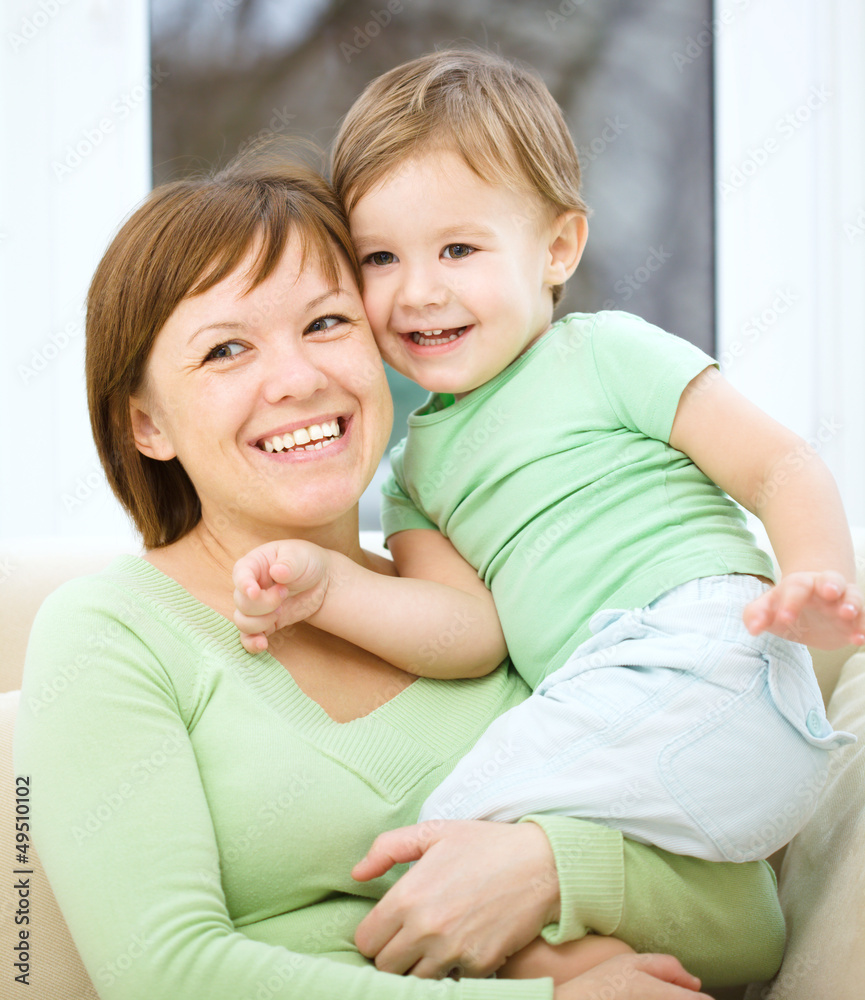 Mother is having fun with her son Mother is having fun with her son