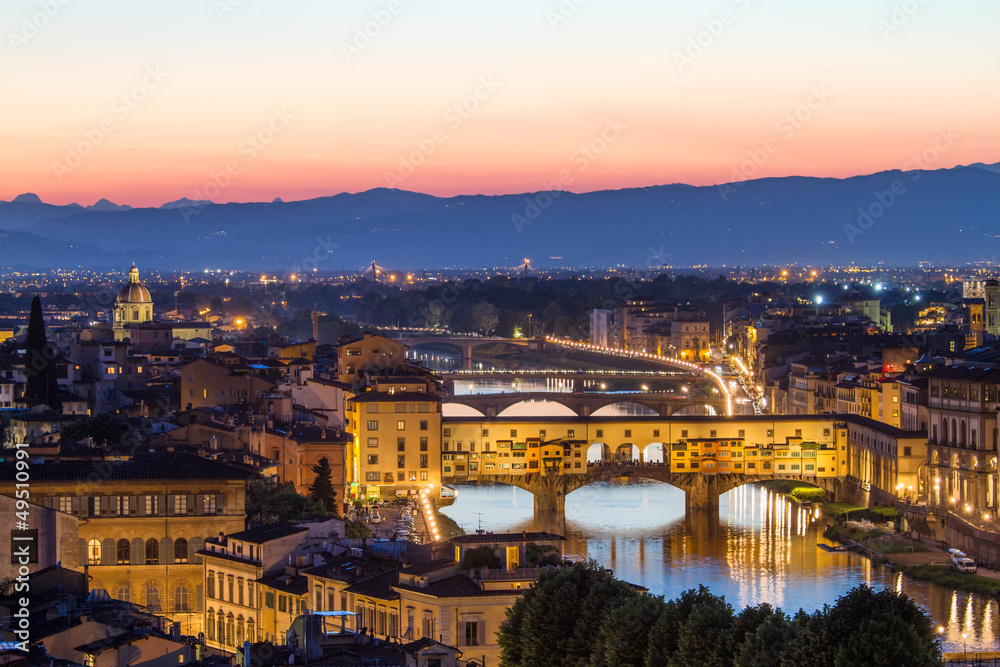 Florence, Arno River and Ponte Vecchio after sunset, Italy