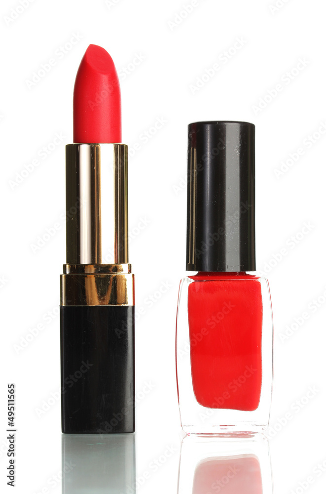 Beautiful red lipstick and nail polish isolated on white