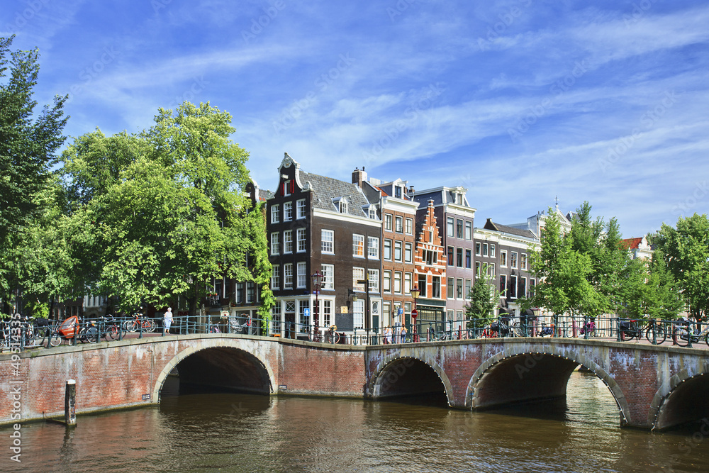 Ancient bridge in the historic canal belt of Amsterdam, The Netherlands.