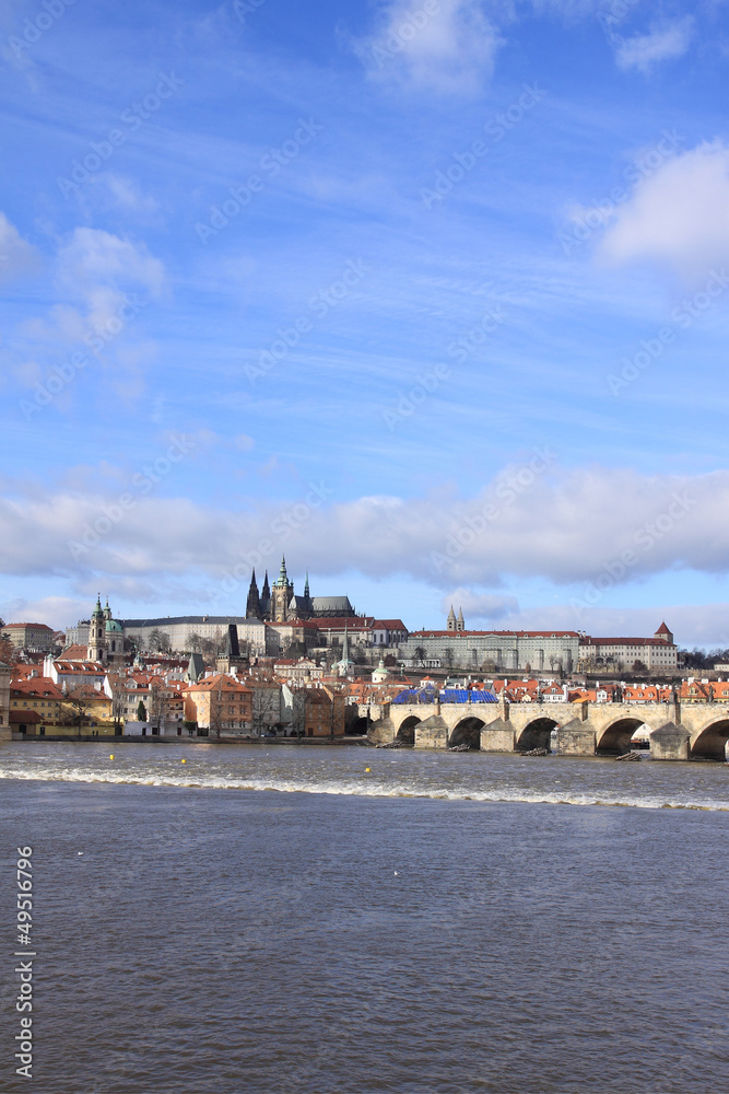 Obraz premium Winter Prague gothic Castle with the Charles Bridge