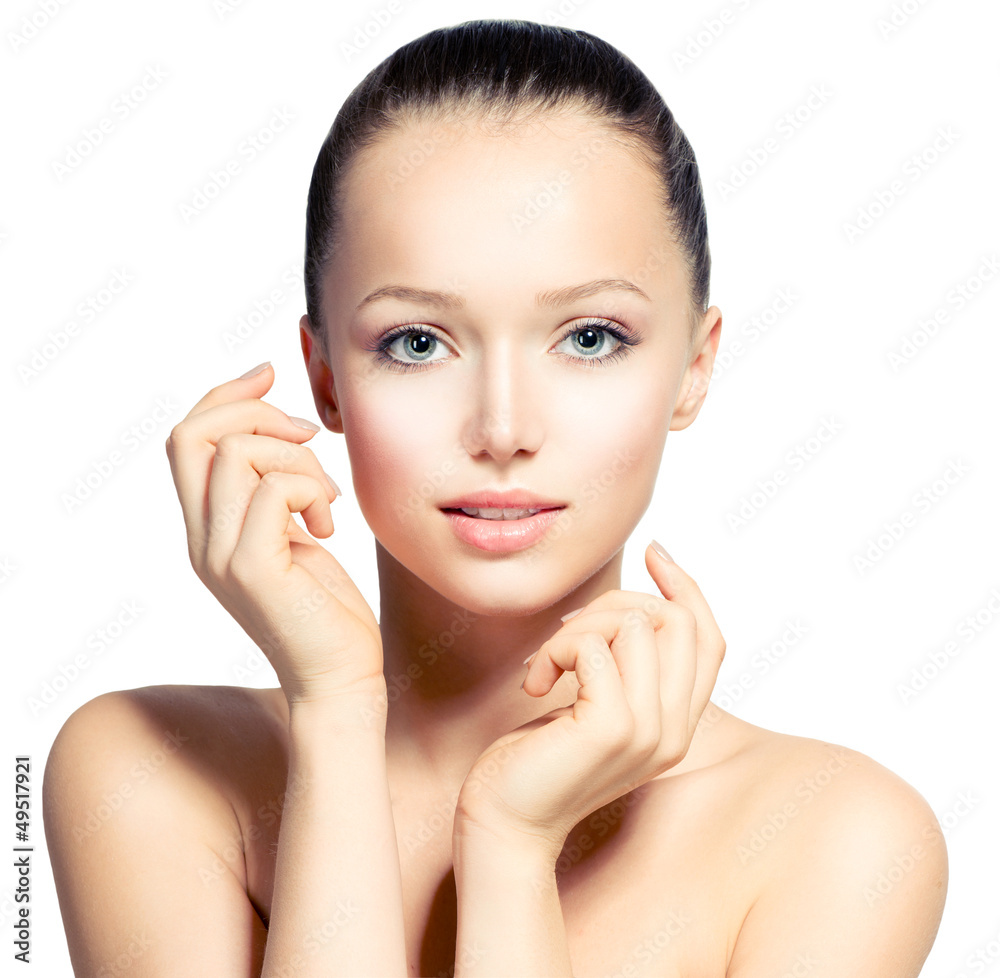 Beautiful Young Woman with Fresh Clean Skin touching her Face Beautiful Young Woman with Fresh Clean Skin touching her Face