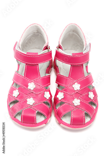pink child's sandals isolated on white background.