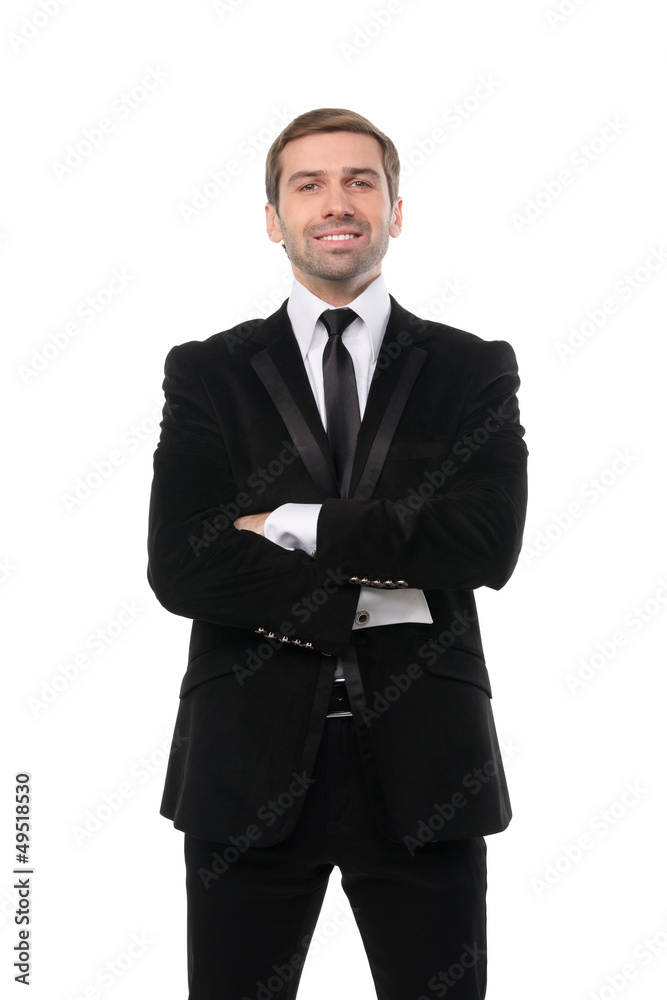 Portrait of young business man smiling with arms crossed. Isolat Portrait of young business man smiling with arms crossed. Isolat