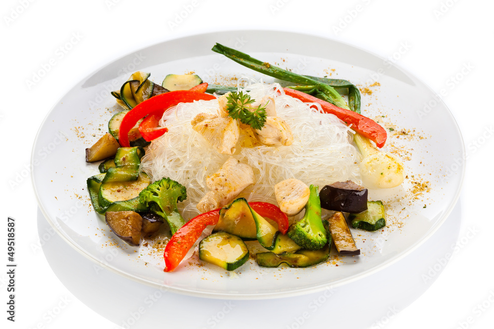 Roasted meat, rice noodles and vegetables on white background Roasted meat, rice noodles and vegetables on white background