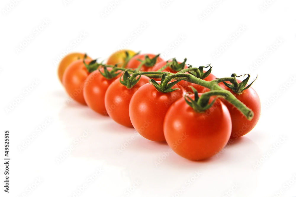 Close Up of cherry tomatoes on the vine