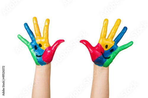 Close up of colorful child hands with smiley faces