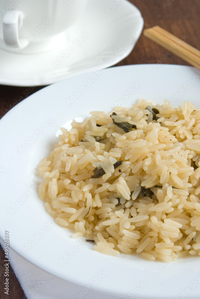 Boiled rice on a white plate Boiled rice on a white plate