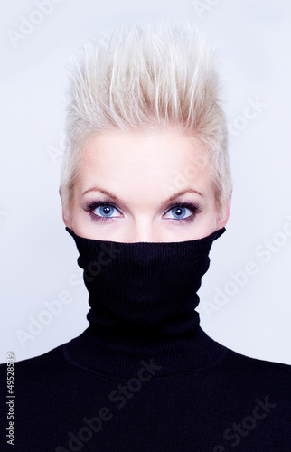 Canvas Print blonde woman with short hair wearing black turtleneck