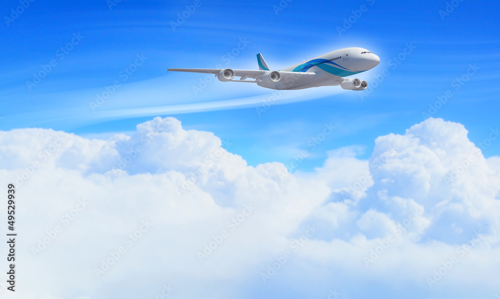 Naklejka premium White passenger plane in the blue sky