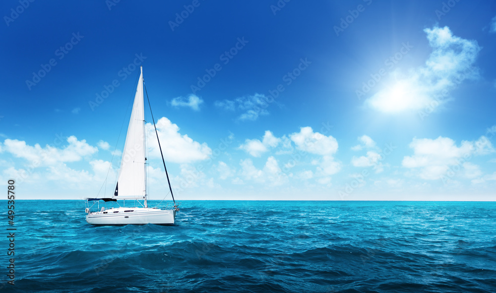 Fototapeta premium Yacht Sailing on water of ocean