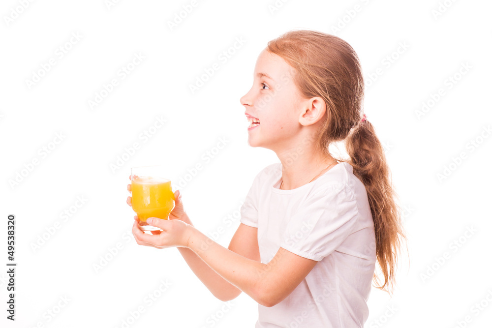 Cute little girl holding glass with juice smiling Cute little girl holding glass with juice smiling