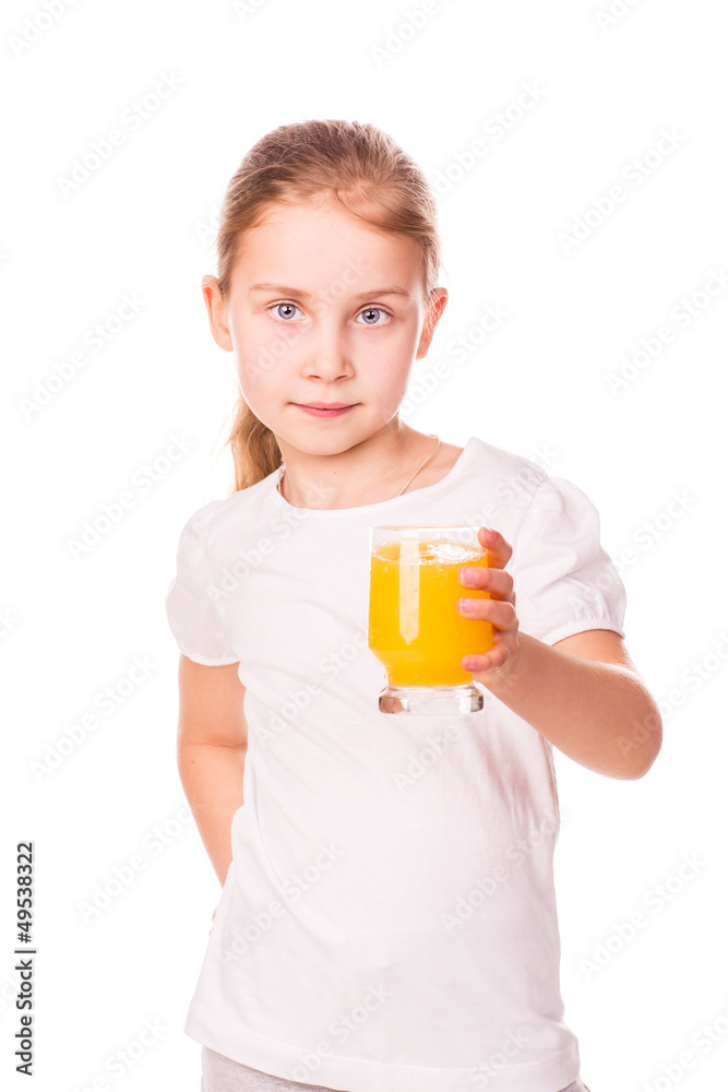 Cute little girl holding glass with juice smiling Cute little girl holding glass with juice smiling
