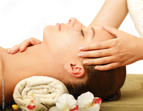 An attractive young woman receiving massage