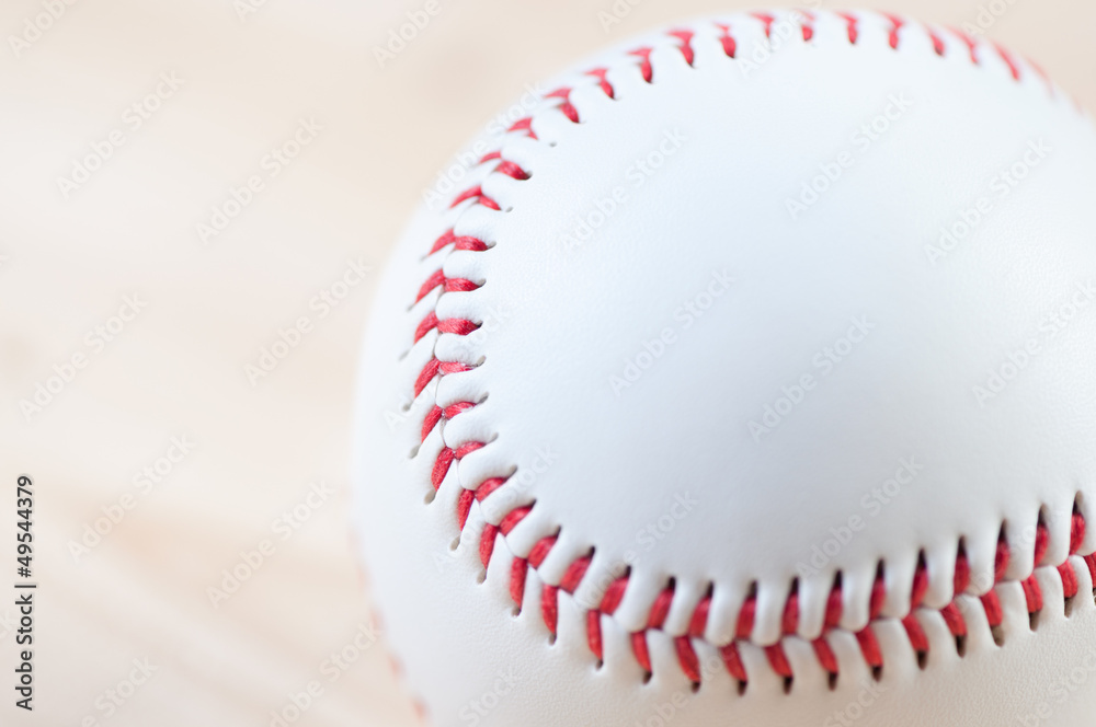 Horizontal shot of a baseball ball, close-up Horizontal shot of a baseball ball, close-up