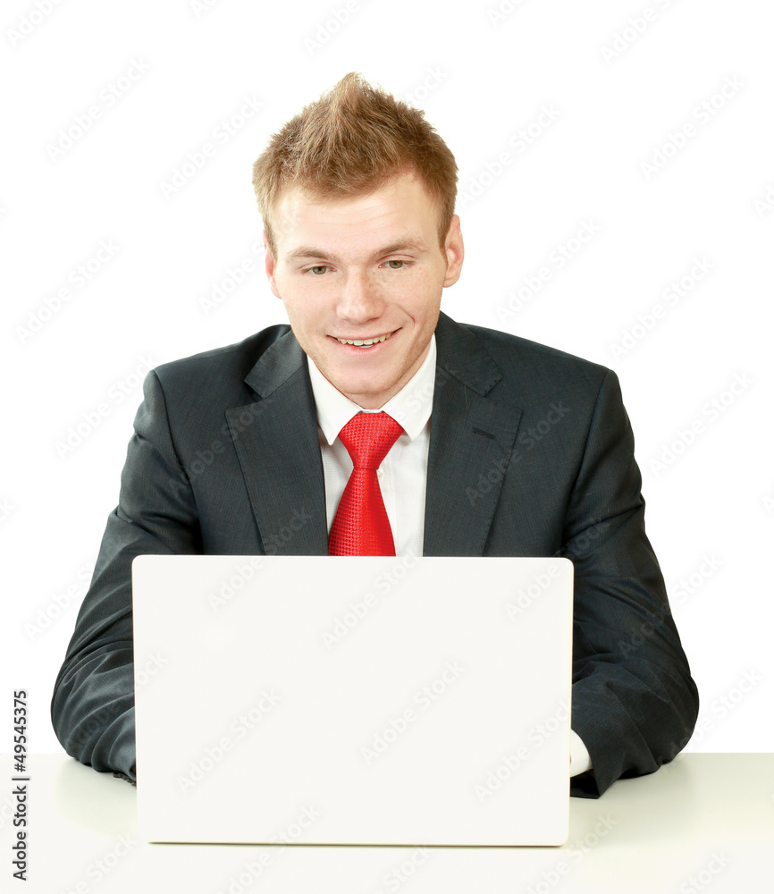 Young businessman at his workplace Young businessman at his workplace