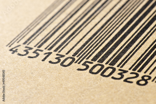 barcode printed on a cardboard box, making macro